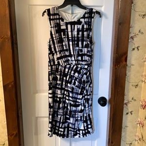 Sleeveless knee-length faux wrap dress